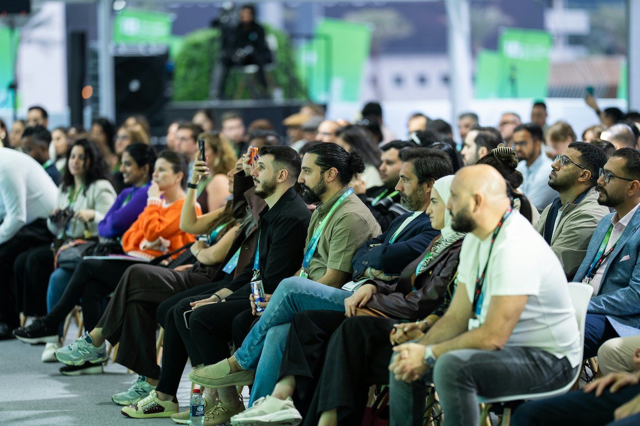 Audience listening attentively at a conference event